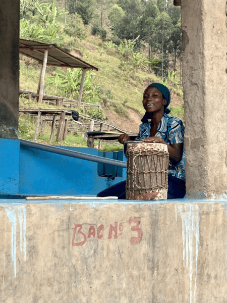 A woman sits on the washing tank